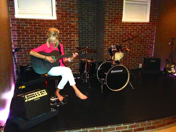 Kris and her Martin plugged into the Fishman Amp